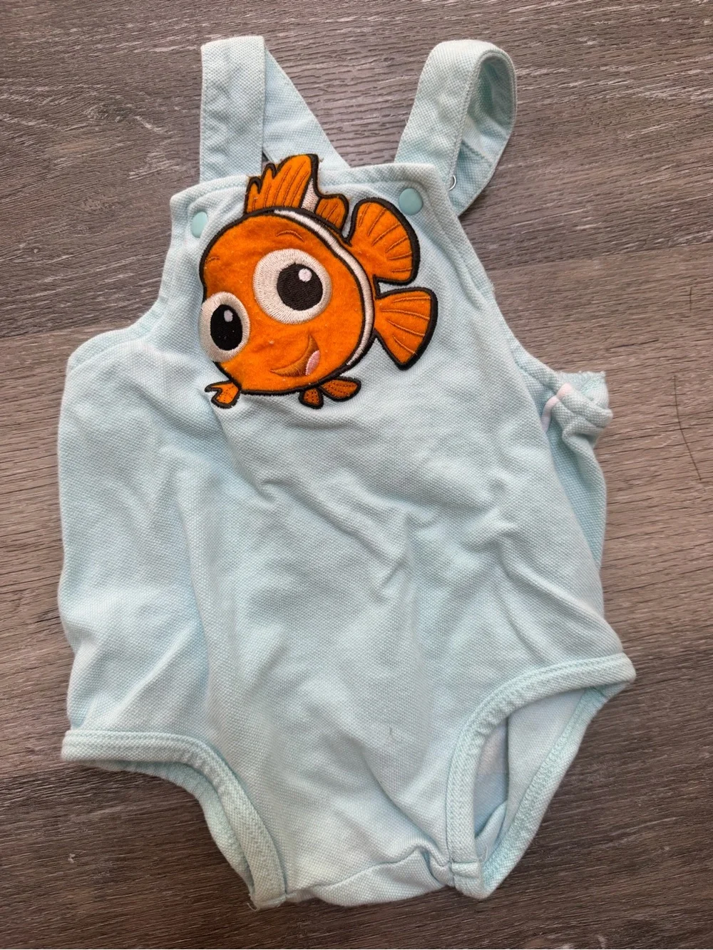Nemo light blue one piece with “nemo” on the back. Y2K Vintage.